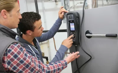 depositphotos_79359866-stock-photo-man-measuring-heat-pump-temperature